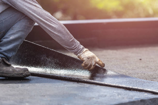 Professional Waterproofing technician working in Pleasant Lake, MI